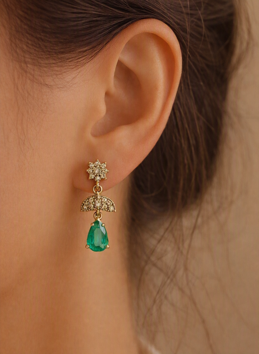My Store rhodium-tone drop earrings with ruby-colored stones, white CZ filigree, and dangling pearls on a stand.