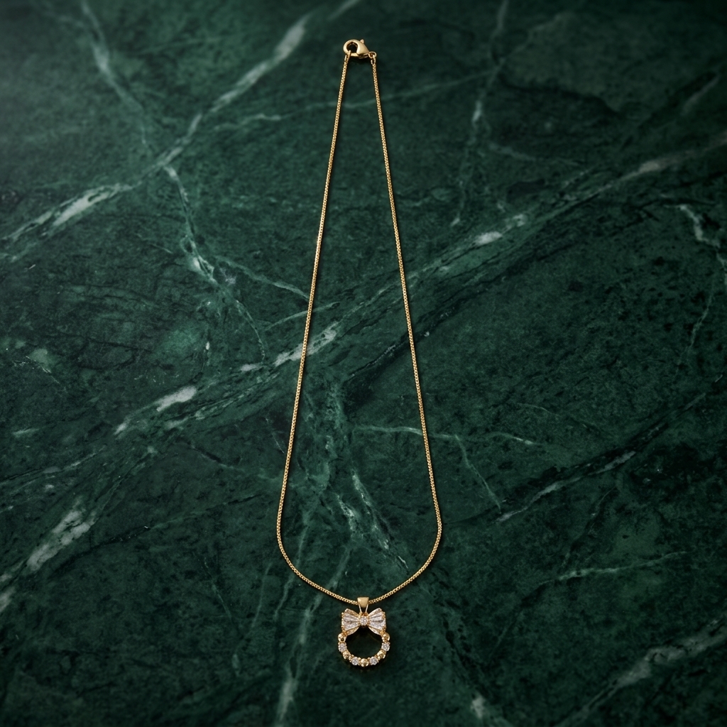 Bow Pendant - worn/model view