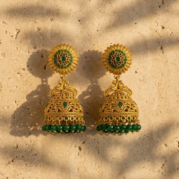Lakx Fashion antique gold-tone brass jhumka earrings with green stone embellishments and beaded dome drops.