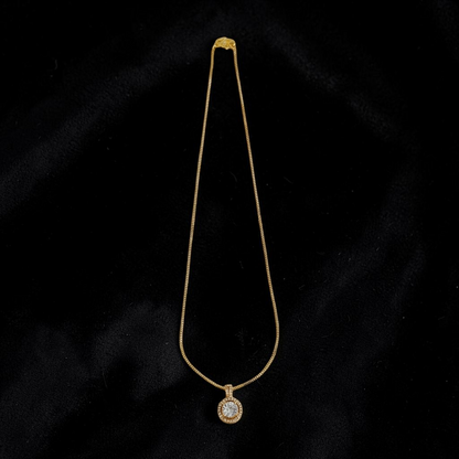Lakx Fashion gold-toned box chain necklace with a circular halo pendant featuring a brilliant clear cubic zirconia.