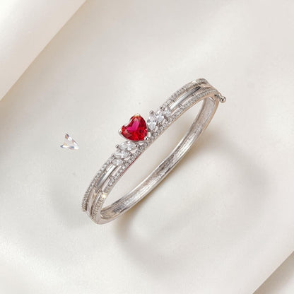 Lakx Fashion rhodium-tone brass kada with a heart-shaped pink stone and clear marquise-cut pavé accents