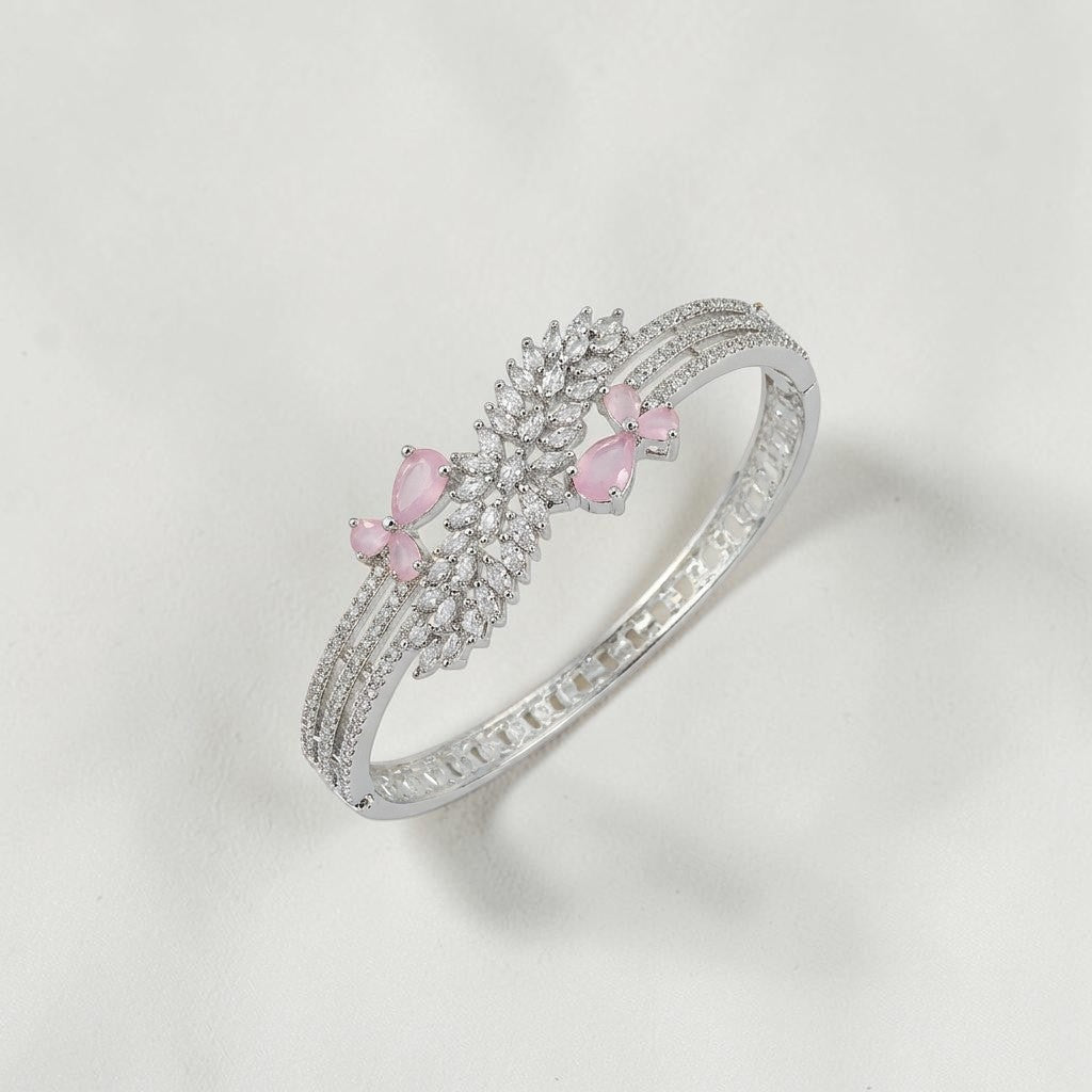 Lakx Fashion rhodium-tone brass bracelet with pink marquise stones and white CZ leaf-inspired clusters.