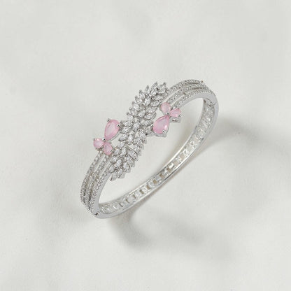 Lakx Fashion rhodium-tone brass bracelet with pink marquise stones and white CZ leaf-inspired clusters.