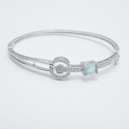 Silver-Tone CZ Bangle with Emerald-Cut Blue Stone