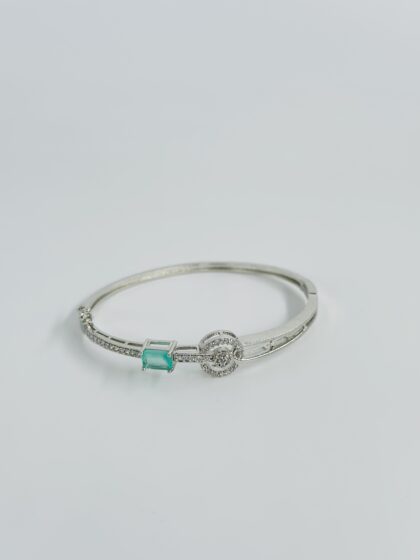 Silver-Tone CZ Bangle with Emerald-Cut Blue Stone