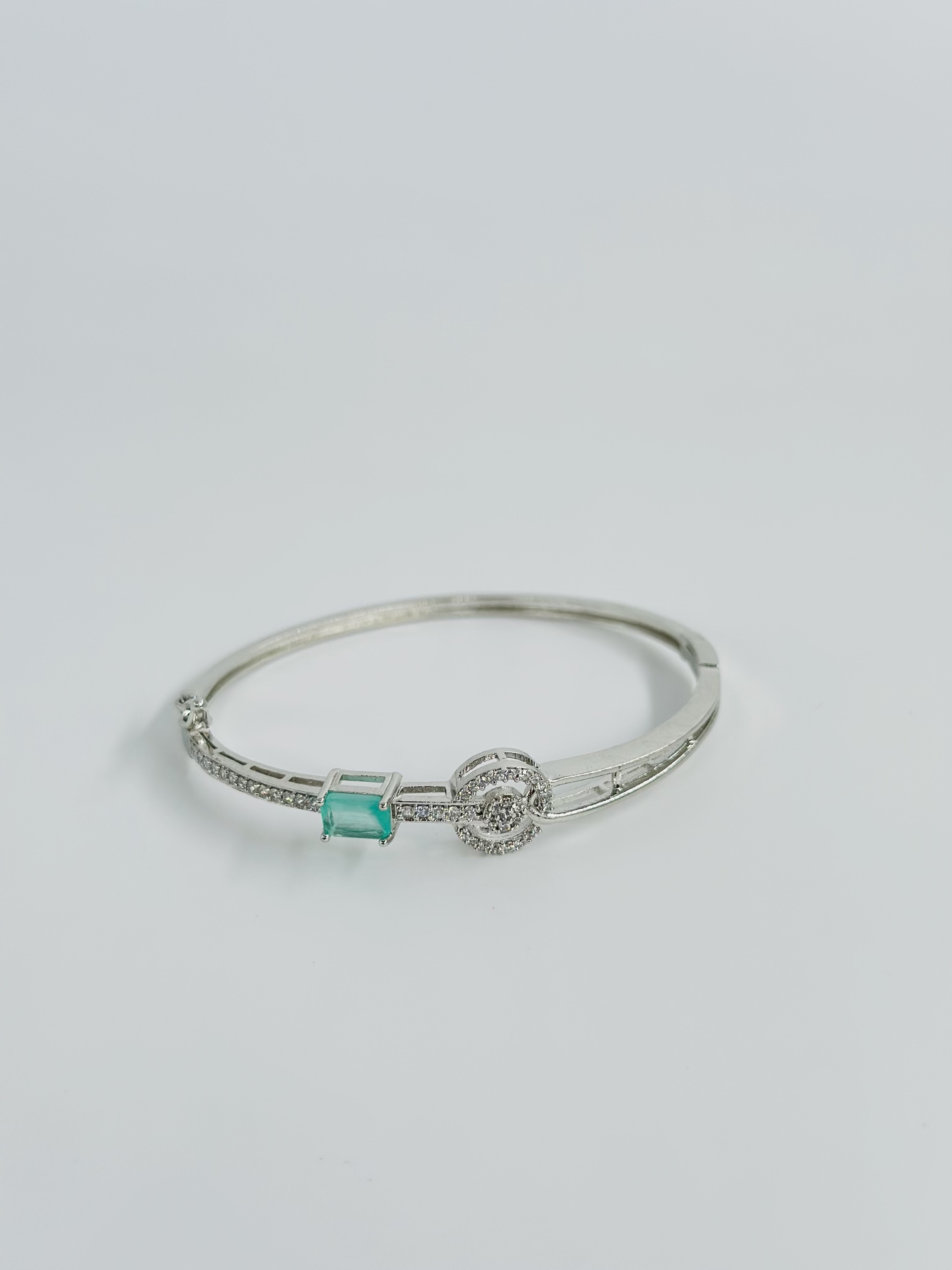 Silver-Tone CZ Bangle with Emerald-Cut Blue Stone